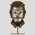 Intricately Carved Metallic Head Sculpture With Stern Facial Features Neck Adornments And Ornamental Details
