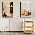 Cozy Massage Bed in Luxurious SPA Setting with Decorative Posters and Gold Cart