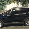 Black Hyundai SUV Featuring Modern Exterior Design Sleek Headlights And Bold Grille