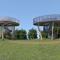 Circular Road Observation Decks With Spiral Stairs Wooden Structures And Metal Railings On Grassland