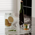 Kitchen Countertop With Glass Jar Cookies Green Bottle And Rosemary Glass Cup
