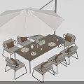 Stylish Outdoor Dining Chairs With Woven Seats Metal Frames And Large Umbrella Table
