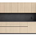 Modern Kitchen With Light Wood Cabinets Black Countertop And Backsplash And Built in Appliances