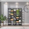 Black Multi Tiered Shelving Unit With Potted Plants Books Storage Boxes And Large Clock