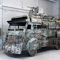 Rusty Armored Modified Car With Roof Weapon Metal Armor In Warehouse Brick Wall Setting