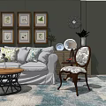 Cozy Sofa and Coffee Table Set with Decorative Pillows Framed Pictures and Area Rug