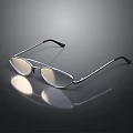 Stylish Silver Metal Frame Glasses With Clear Lenses And Reflective Surface On Black Background