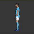 A Man Wearing Manchester City Blue Jersey White Shorts Blue Socks And Blue Shoes Standing