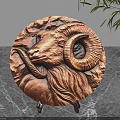 Copper Circular Decorative Ornament Set With Ram Head Carving Stone Texture On Marble Tabletop