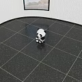 Cute Black And White Panda Plush Toy Sitting On Black Floor With White Spots