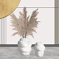 Two White Stacked Vases With Dried Pampas Grass And Golden Circular Decor On Marble Floor