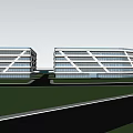 Modern Industrial Factory With Multistorey Structure And Large Glass Windows Surrounded By Trees And People