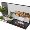 Modern Water Fountain With Flowing Water Koi Fish Decorative Plants And Warm Lighting