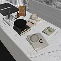 Stylish White Marble Kitchen Countertop With Books Vase Clock Bowl And Sphere