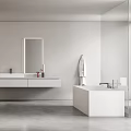 Modern Minimalist Bathroom Interior With White Vanity Mirror Bathtub And Glass Shower On Gray Floor