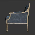 Elegant Blue Upholstered Chair With Gold Frame Armrests And Classic Legs