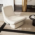 Elegant White Modern Leisure Chair on Light Carpet with Black Side Table and Books