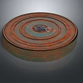 Ancient Rusted Circular Weapon With Concentric Rings And Central Ornament
