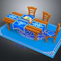 Wooden Dining Table With Blue Patterned Tablecloth And Chairs On Blue Rug With Book Cup