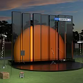 Outdoor Stage Setup With Orange Circular Structure Glass Curtain Wall And Lighting Equipment At Sunset