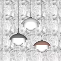 Modern Three Colored Dome Shaped Pendant Lights Hanging In Interior Space 3d model