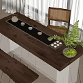 Wooden Tea Table and Rattan Chair with Tea Tray Cups Canisters and Green Plant