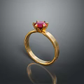 Statement Polished Gold Ring With Red Gemstone And Elegant Design