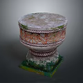 Decorative Stone Pedestal With Moss Covered Round Top Spiral Red Orange Patterns And Square Base