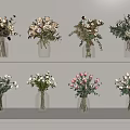 Various Beautiful Flowers in Glass Vases Arranged on White Shelves for Home Decor
