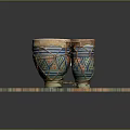 Traditional Ornate Decorative Hand Drums On Colorful Patterned Square Mat