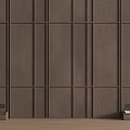Brown Wooden Background Wall With Modern Geometric Panel Design And Lower Shelves With Vase And Books