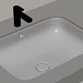 Modern White Built in Washbasin with Chrome Faucet on Light Countertop