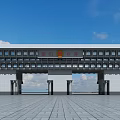 White Building Exterior Wall Symmetrical Design Red Emblem On Top Against Blue Sky Spacious Square