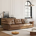 Brown Leather Sectional Sofa In Living Room With White Walls And Window