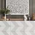Modern Entryway Console Cabinet With Geometric Doors Potted Plant And Abstract Wall Art