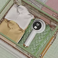 Transparent Drawer with Folded White Yellow Shirts Green Sweater and Handheld Garment Steamer Display 100
