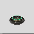 Black Circular Precision Mechanical Device With Green Ring And Metal Screws