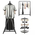 Metal Clothes Rack With Wheels Hanging Different Colored Apparel And Garments