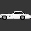 Silver Classic Sports Car With Sleek Body And Vintage Design Elements
