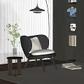 Modern Accent Chair With Curved Back Beige Cushion Side Table Green Plant And Wooden Floor