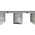 Modern Office Desk With Unique Cylindrical Stone Legs And Textured Surface Design