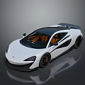 White McLaren Sports Car With Black Roof Orange Interior Black Wheels And Rear Spoiler