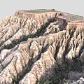Scenic Natural Landscape Of Eroded Cliffs With Grass Covered Top And Vegetation At Base
