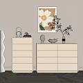 Stylish Entryway Cabinet And Sideboard With Light Colored Drawers Decorative Painting And Potted Plant