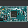 Green Microcontroller Development Board With Electronic Components Pin Headers And Chip