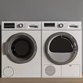 White Modern Washing Machine And Dryer With Round Doors Control Panel On Wooden Floor