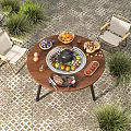 Outdoor Round Table with BBQ Grill Fresh Food and Two Chairs in Garden Setting