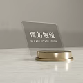 Transparent Acrylic Sign With Golden Base Displaying Please Do Not Touch Text