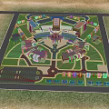 Aerial View Plan of Modern Building Complex with Green Lawns Parking Lots and Road Layout