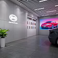 BYD Garage Showroom Interior With Two Gray And Red Cars And Lighting